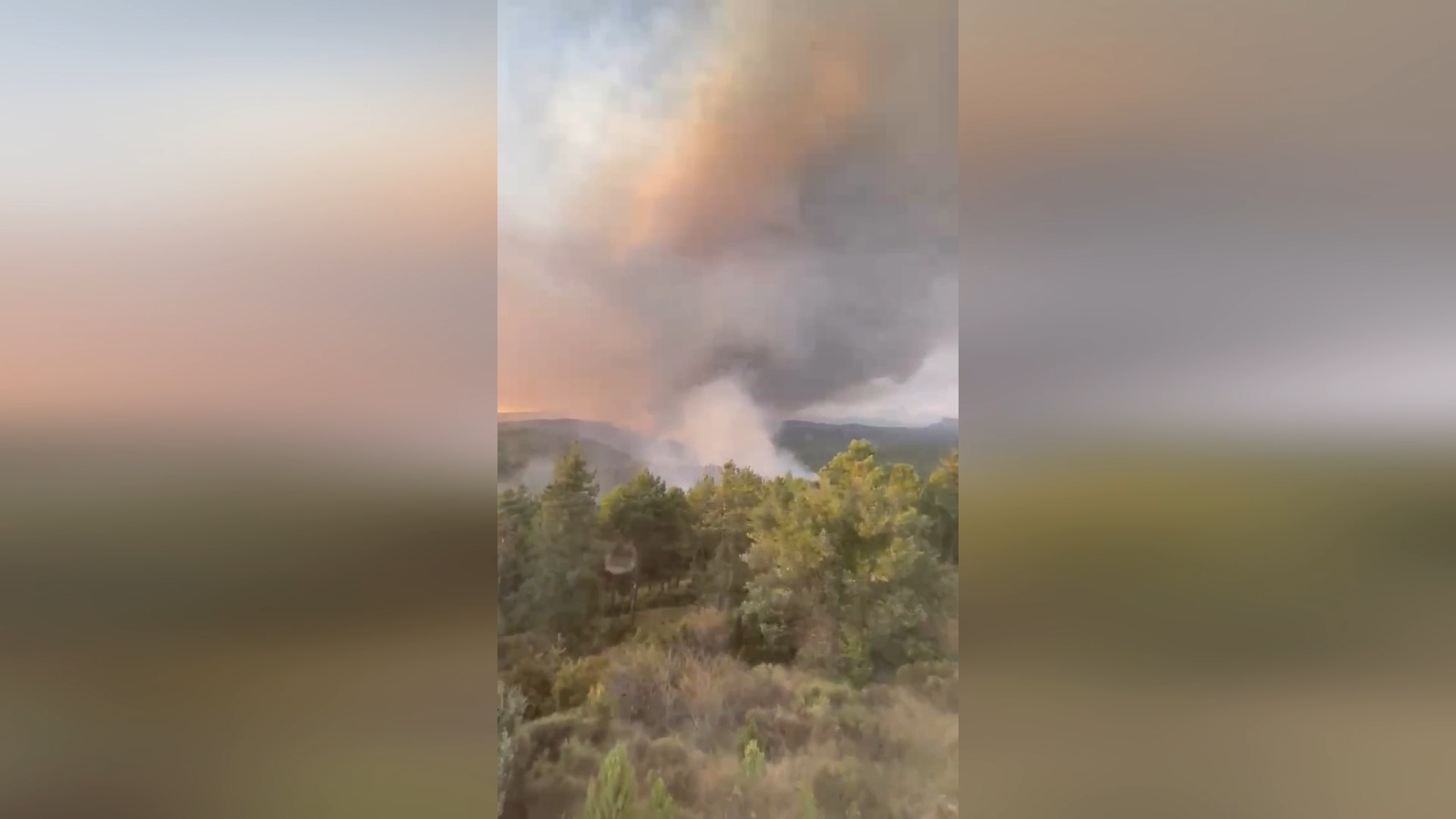 Massive Smoke Plumes Rise Over Spanish Hills As Peñas De Riglos Wildfire Rages On episode artwork