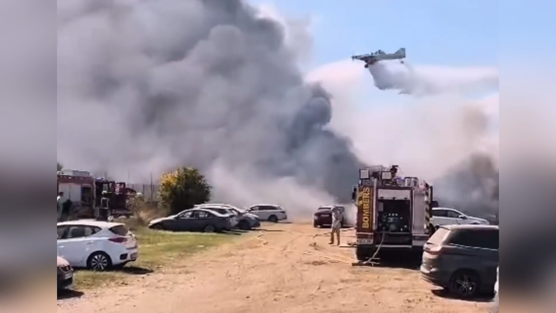 Plane Drops Fire Suppressant As Massive Blaze Engulfs 34 Vehicles In Spain episode artwork