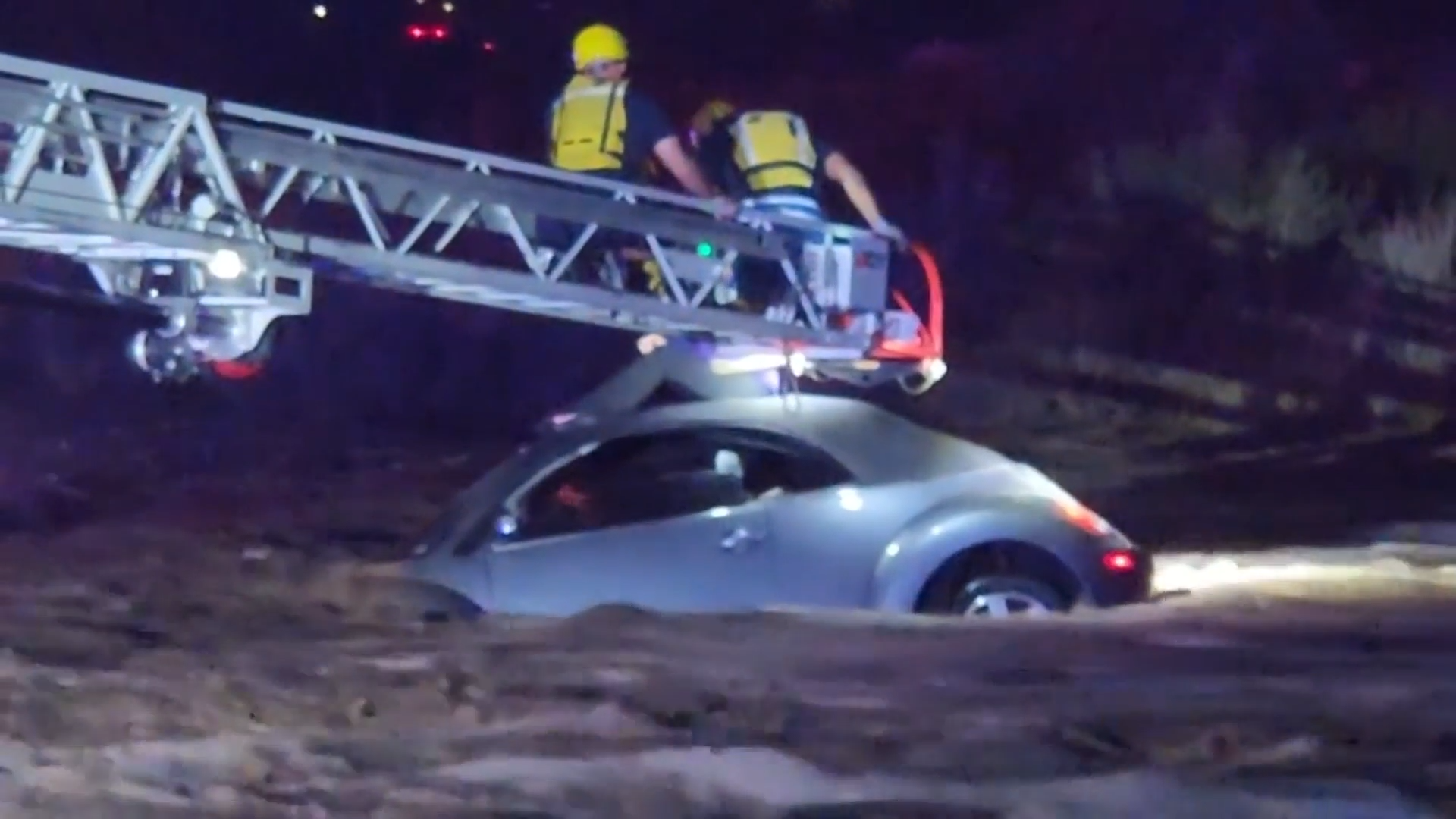 Firefighters Race Into Floodwaters To Rescue Driver Trapped On Car Roof In Arizona episode artwork