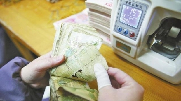 un-oras-din-china-isi-procura-o-parte-din-energie-din-arderea-bancnotelor-scoase-din-uz