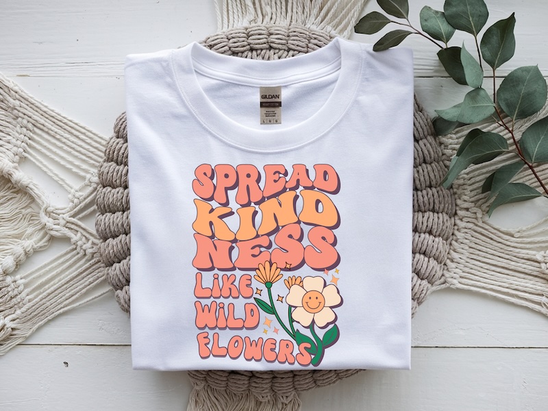 T-shirt mockup on a macramé mat from directly above