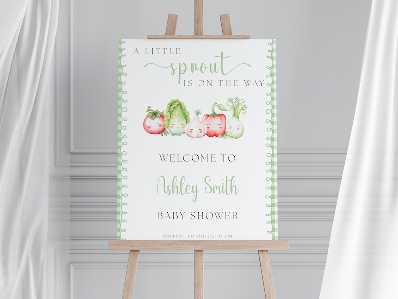 Baby shower welcome sign on an easel in a plain studio setup