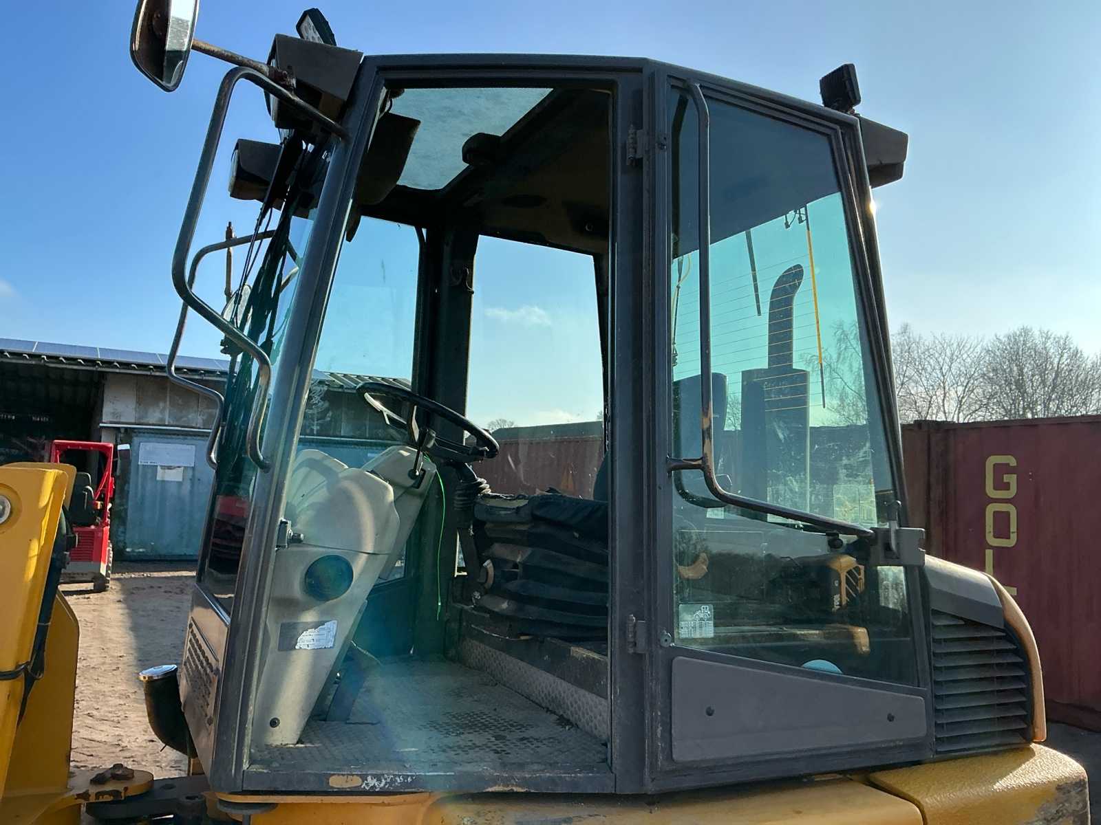 Ahlmann AL85T shovel (2003) met snelwissel en palletbord + bak