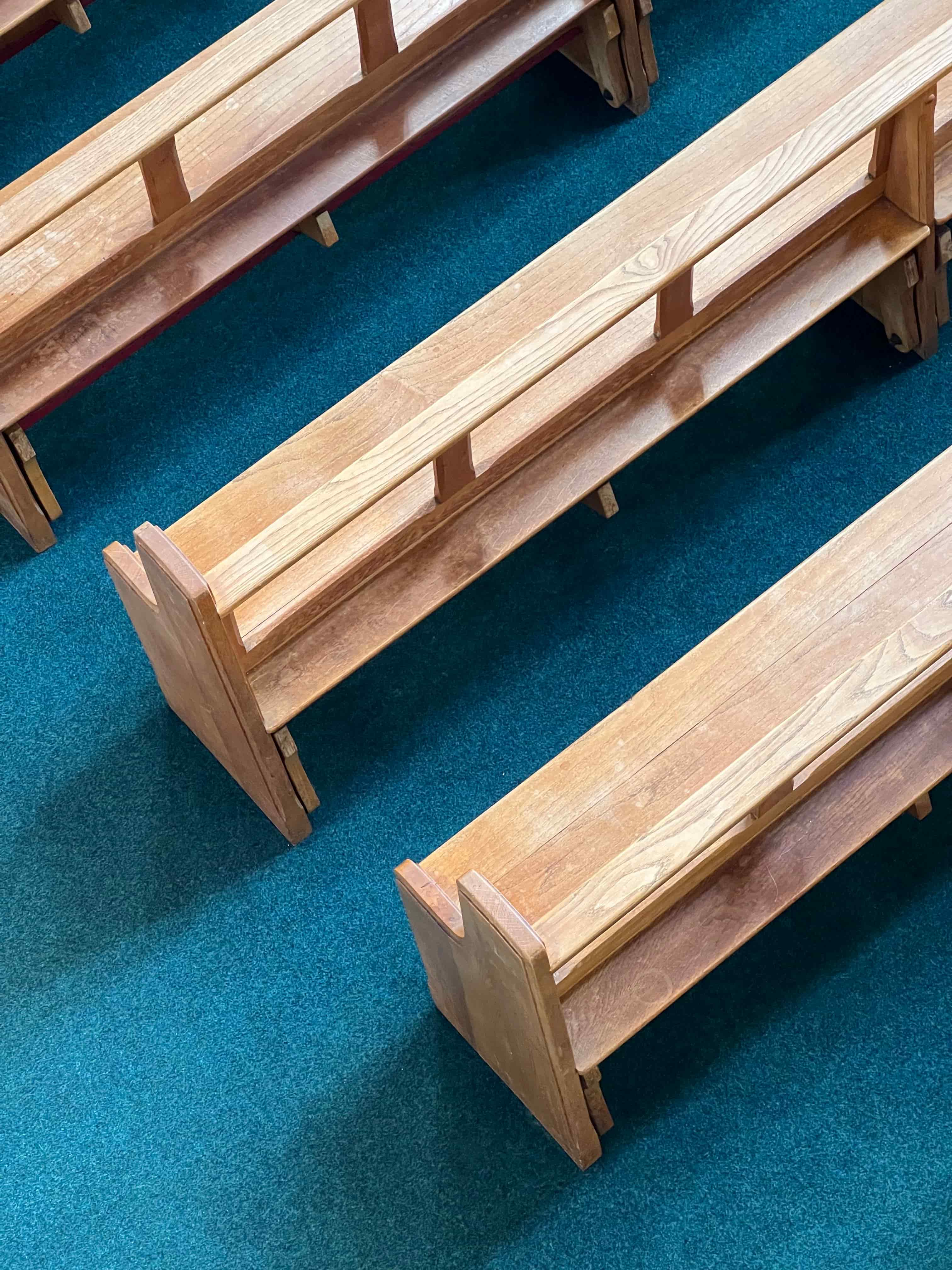 Church pews representing parish communities