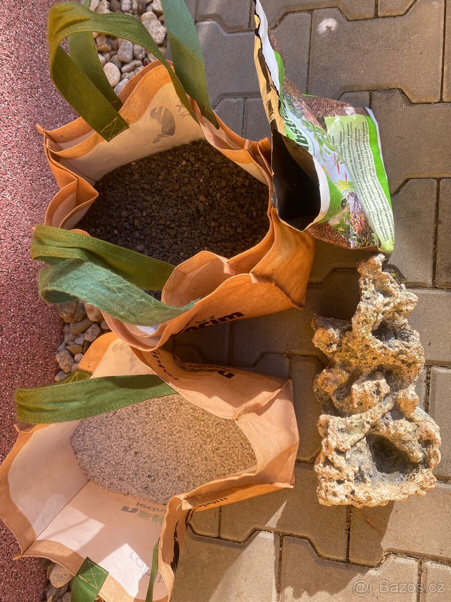 Písek do akvária, šedý/cerny, světly, kámen.