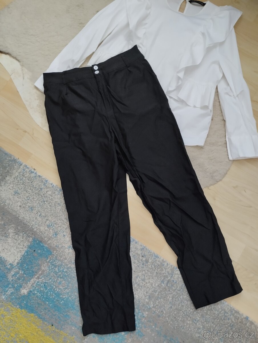 Černé dámské kalhoty vel 42-44