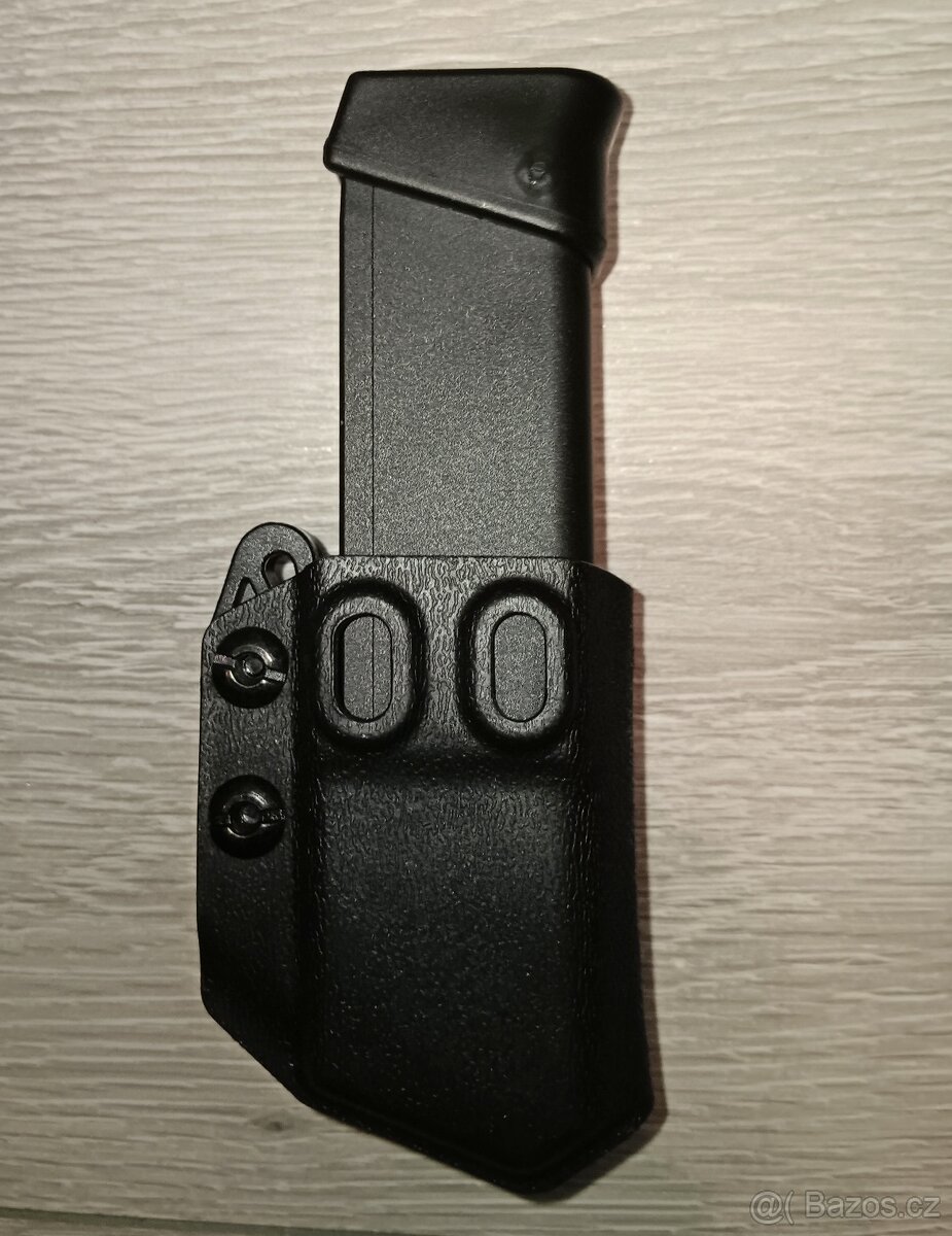 Pouzdro na zásobník nastavitelné univerzální