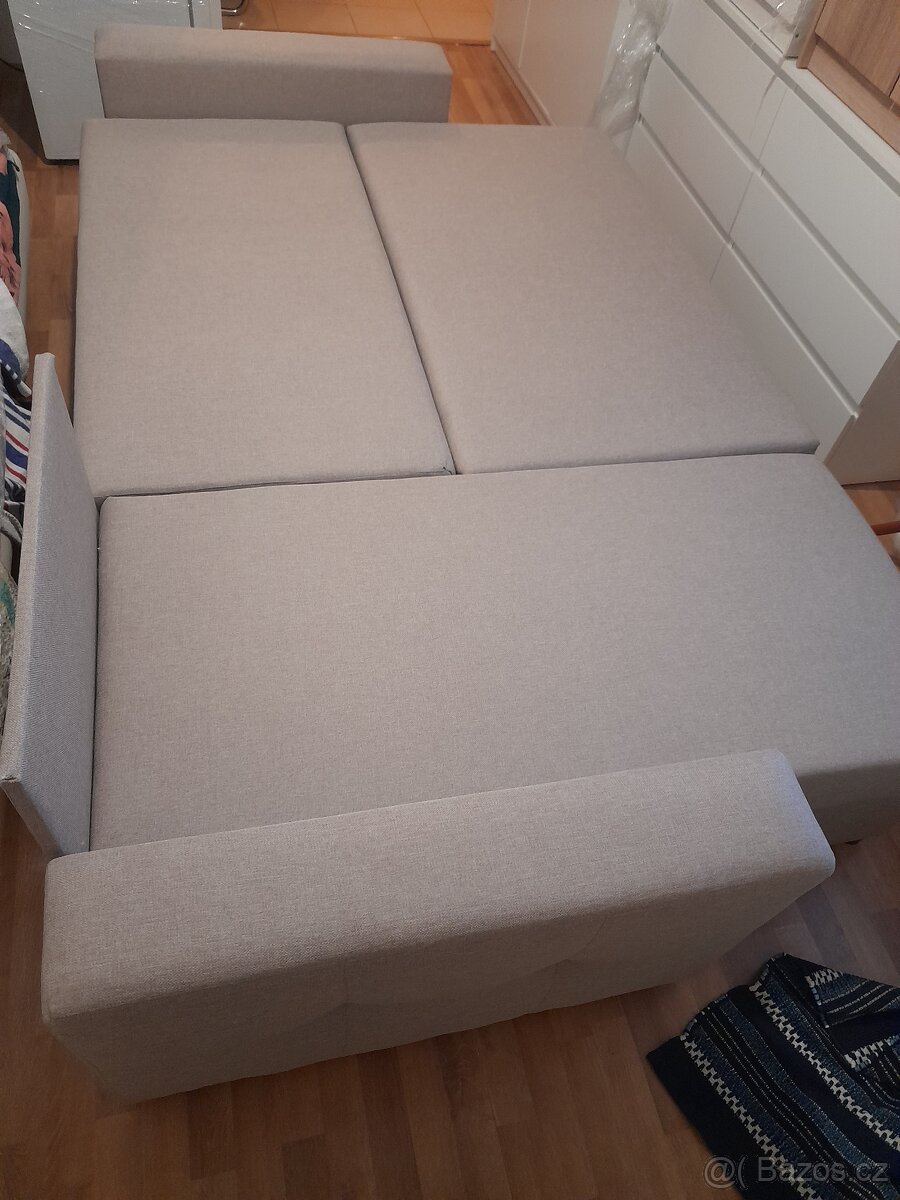 Prodám zánovní rohovou rozkládací sedačku