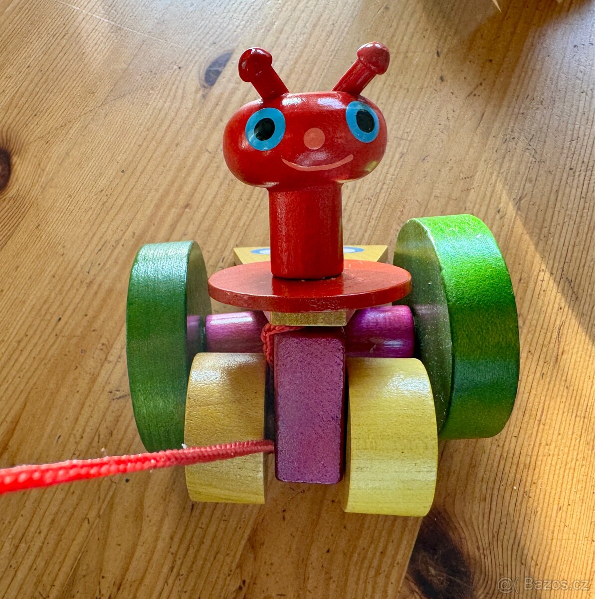 Dřevěná hračka - tahací motýlek