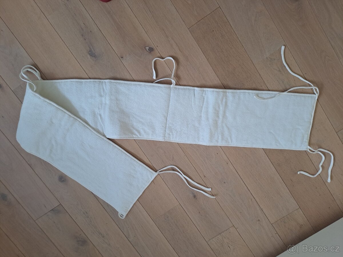 ochranný mantinel do dětské postýlky bílý