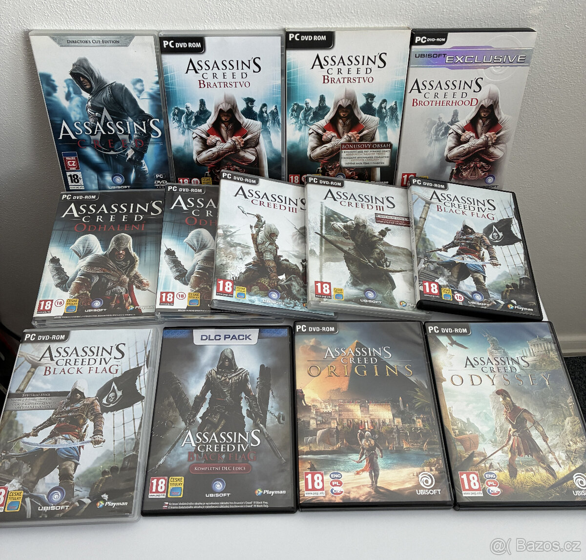 Použité PC hry série Assasins Creed + merch