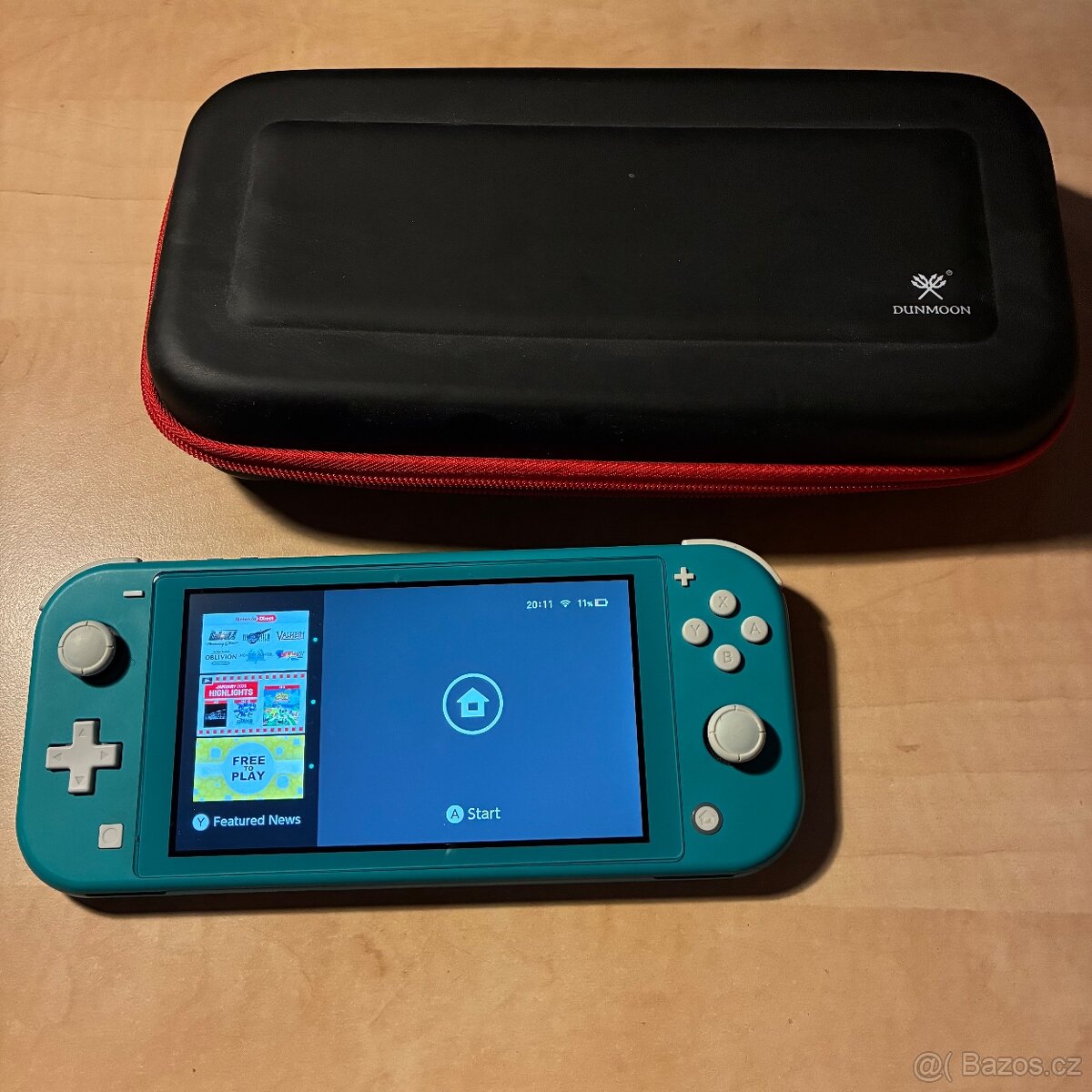Nintendo Switch Lite + obal. + micro SD karta