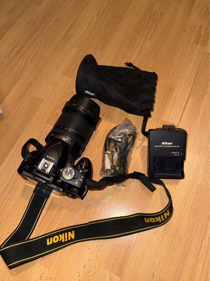 Nikon D5200 + 18-105 VR Kit