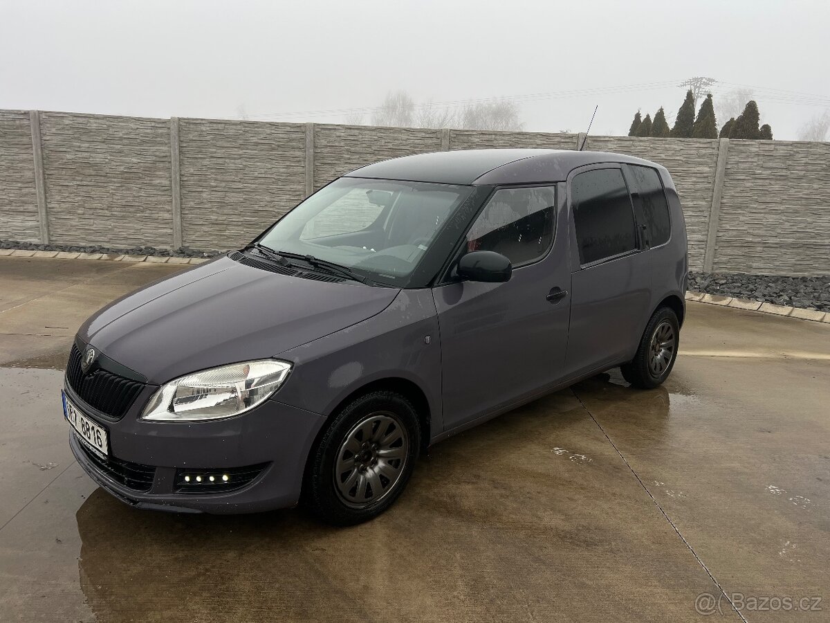 Roomster praktik 1.2 tdi 55kw 2011