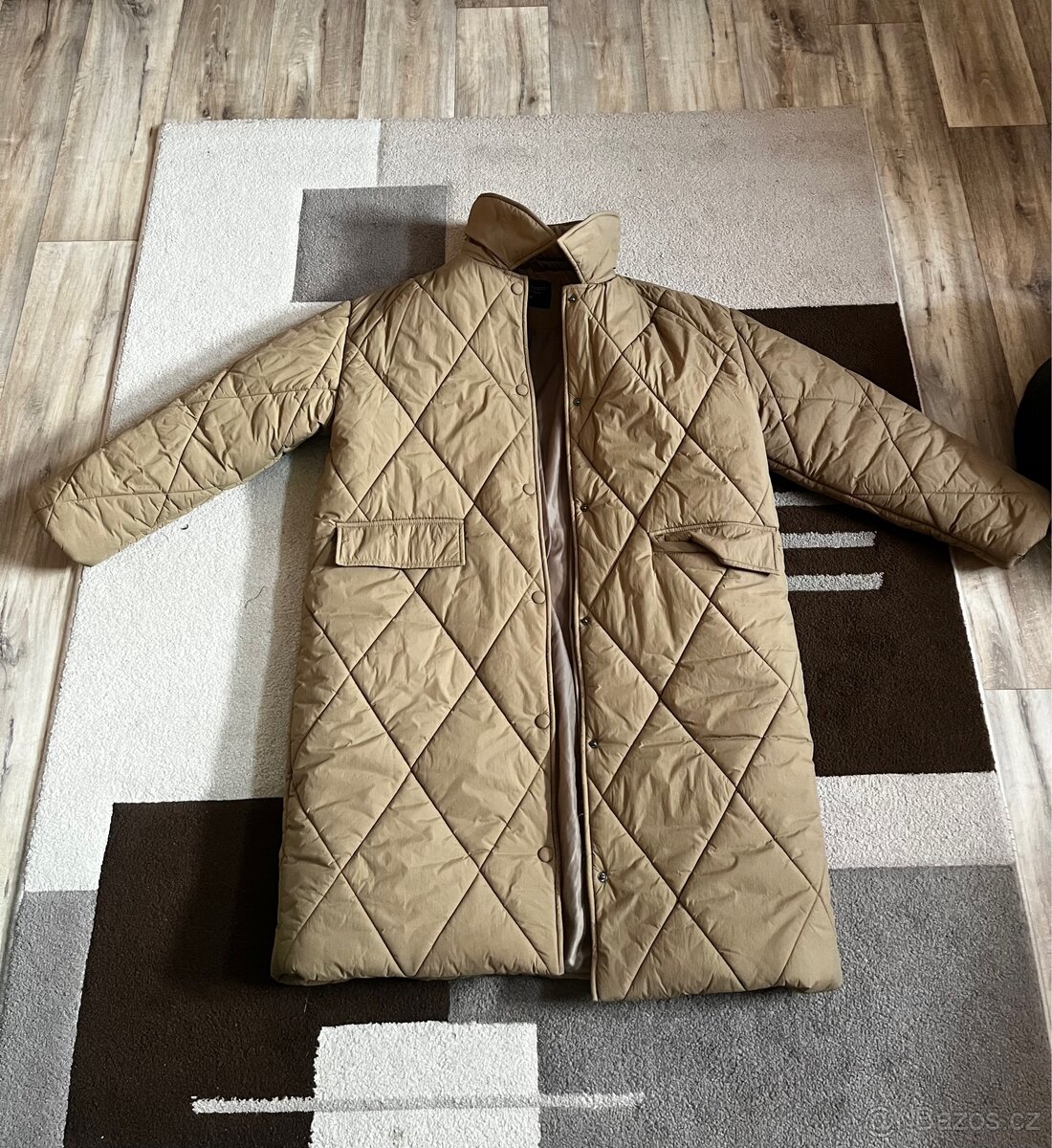 Nový dámský kabát