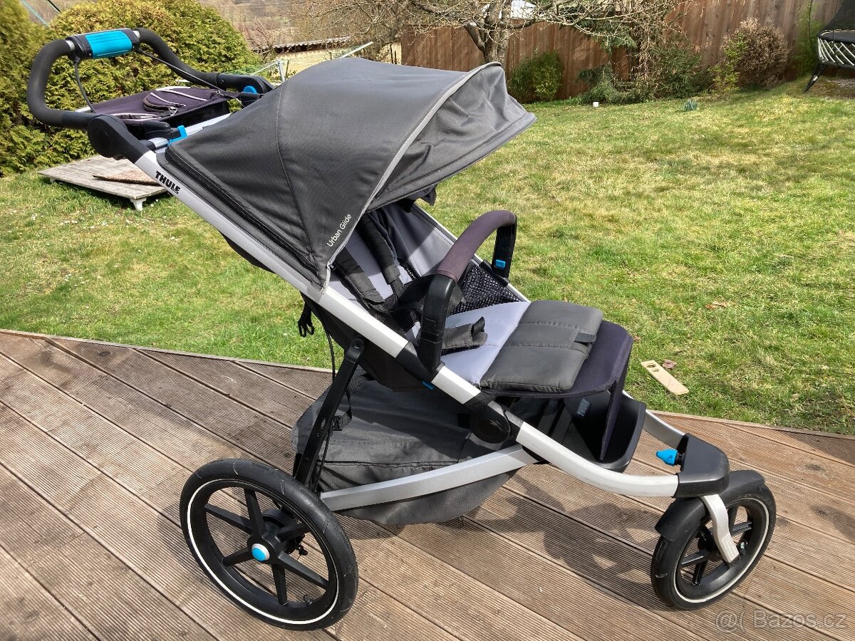 Thule Urban Glide 2 + pláštěnka + podnožník