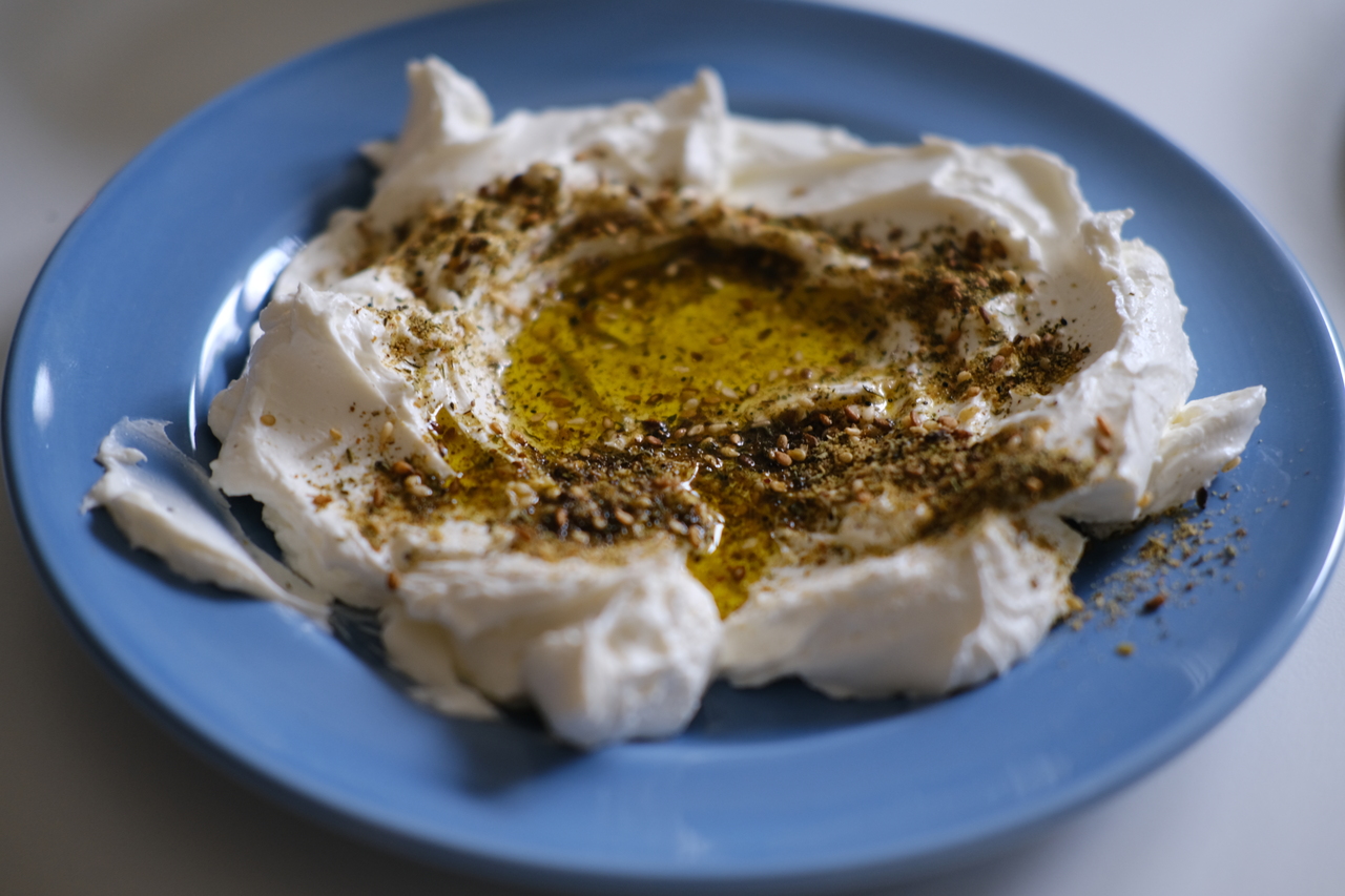 Labneh (strained yogurt) topped with the za'atar spice mix and olive oil, in my apartment in Amsterdam, 2022.