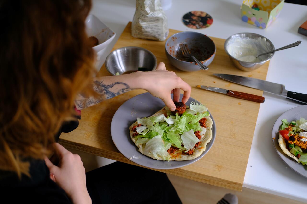 Turkish pizza with falafel and vegetables, as decadent brunch, in my apartment in Amsterdam, 2022.