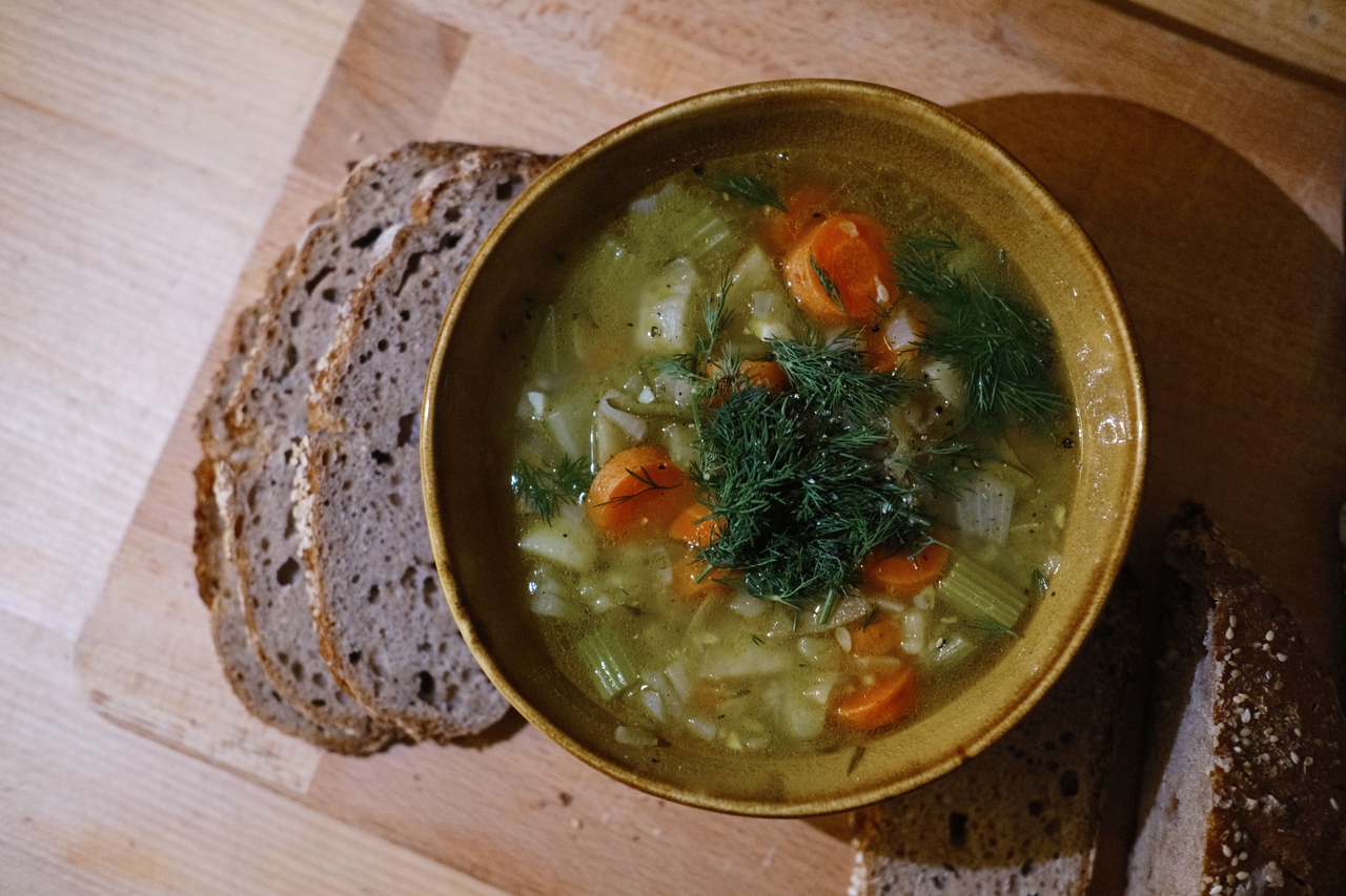 Pickle soup with dill, with homemade rye sourdough bread, in my apartment in Amsterdam, 2023.