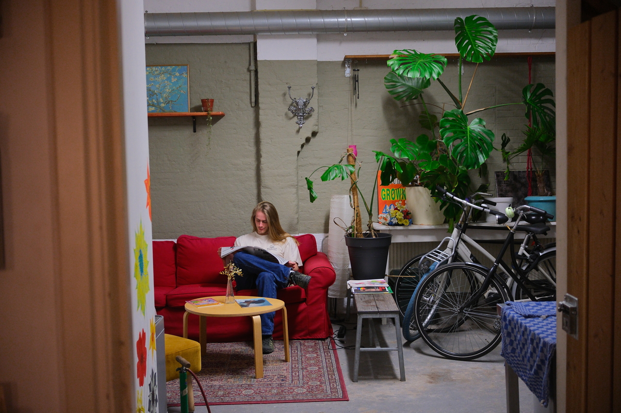 Me reading a newspaper somewhere in Amsterdam, 2025.