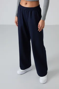 بنطال رياضي نسائي باللون الازرق الداكن - Фото 6