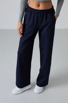 بنطلون رياضي نسائي واسع الساق بخصر عالٍ وجيوب بلون ازرق داكن - Фото 4