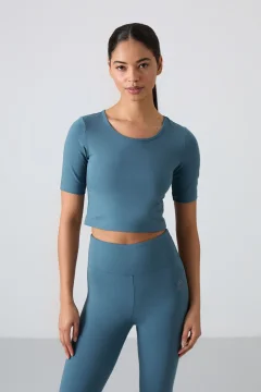 طقم رياضي نسائي بقصة ضيقة باللون الأخضر الغابة - Фото 9