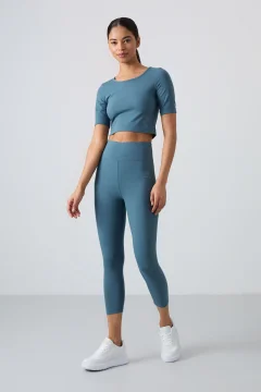 طقم رياضي نسائي بقصة ضيقة باللون الأخضر الغابة - Фото 2