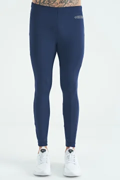 لباس ضيق رجالي رياضي بقصة ضيقة وطبعة شعار نيلي بخصر عالٍ - Фото 3