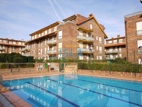 Isla Trasmiera takvåning foto 6328782