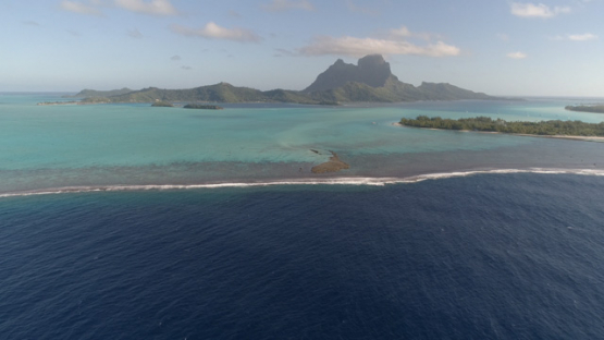 Aerial panoramic view of the island Bora Bora and reef, Tupitipiti, 4K UHD