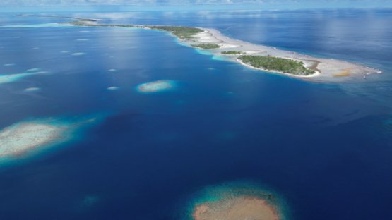 Aerial drone view of the atoll Tahanea, lagoon and islets, 4K UHD