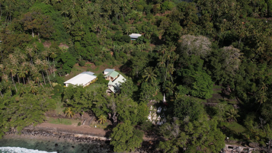 Tahuata, aerial drone view, Church of Hapatoni bay, marquesas islands, Polynesia, 4K UHD