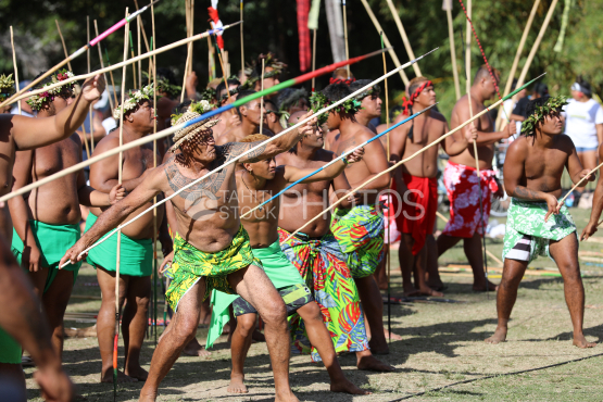 Tahiti, Polynesian men with pareo, traditional javelin throwing competition, Tuaro Maohi, Polynesia