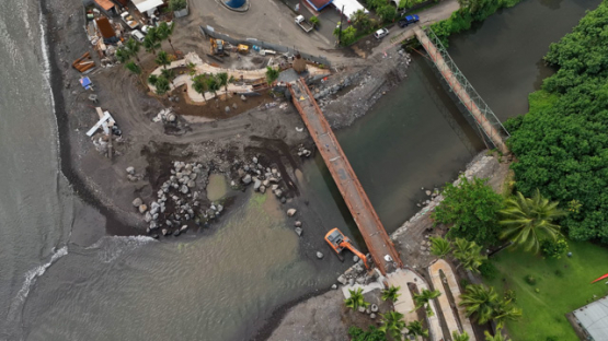 Teahupo, aerial drone view of public works of the bridge, 4K UHD