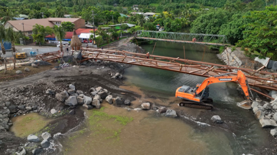 Teahupoo, aerial drone view of public works of the bridge, 4K UHD