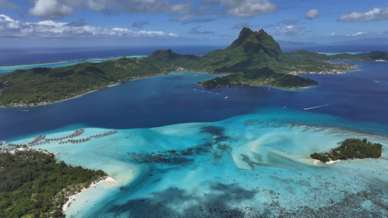 Aerial view by drone, Island of Bora Bora, French Polynesia, 4K UHD