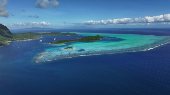 Aerial view by drone, Island of Bora Bora, French Polynesia, 4K UHD