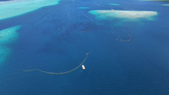 Aerial drone view, Raiatea, lagoon, pearl farm, 4K UHD