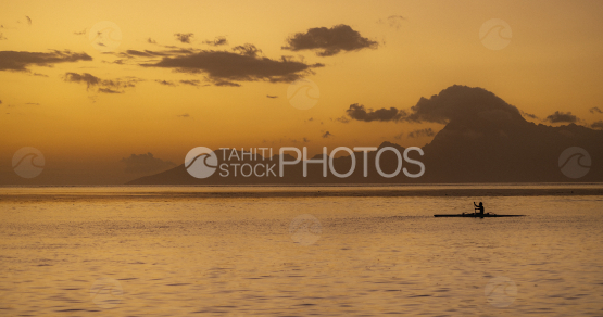 sunset, outrigger in the lagoon, French Polynesia