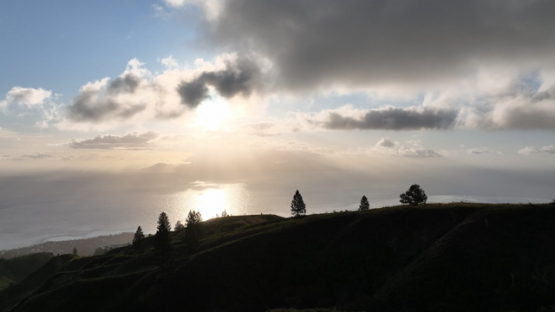 Aerial drone view, sunset , Vaitavere, Moorea in background, 4K UHD