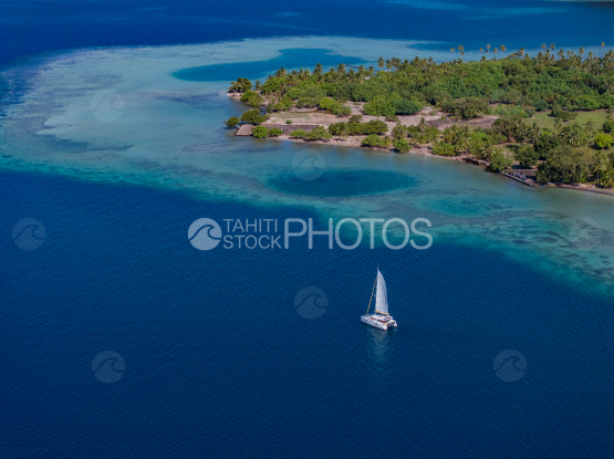 Raiatea, Sailing boat in the lagoon, French Polynesia, Aerial 