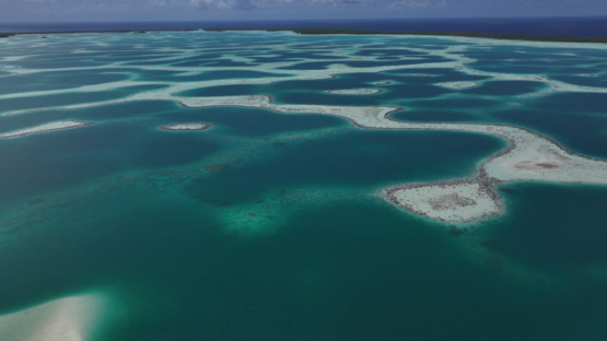 Drone Aerial View of Mataiva Atoll and its Reticulated Lagoon, Leopard Lagoon, Tuamotu Archipelago, French Polynesia
