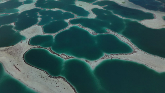 Drone Aerial View of Mataiva Atoll and its Reticulated Lagoon, Leopard Lagoon, Tuamotu Archipelago, French Polynesia