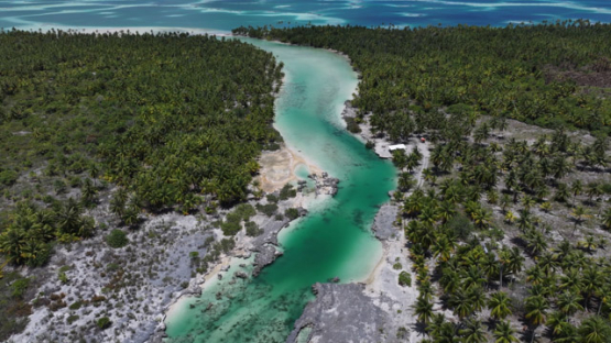 Drone Aerial View of Mataiva Atoll and its Reticulated Lagoon, Leopard Lagoon, Tuamotu Archipelago, French Polynesia