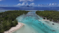 Bora Bora view from Tahaa, Drone Aerial Shot of Tahaa Lagoon with Mount Otemanu,Bora Bora, on the horizon, French Polynesia