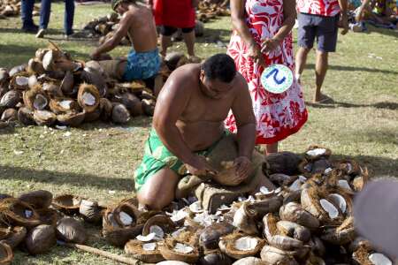 Traditional polynesian sports contest, Coconut shelling, Tahiti, French Polynesia