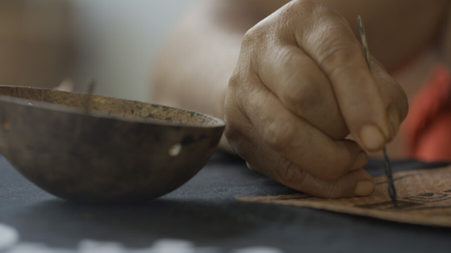 Marquesan Woman Painting Traditional Tapa Cloth
