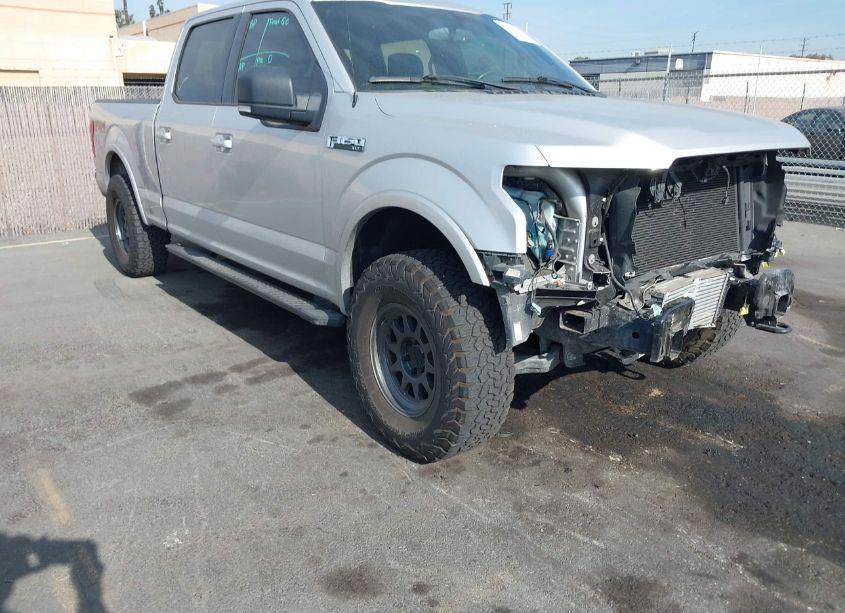 Main photo of 2019 FORD F-150 XLT with VIN 1FTFW1E45KKC69810