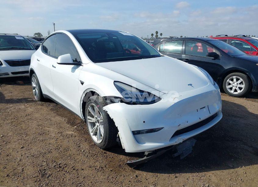 Main photo of 2022 TESLA MODEL Y LONG RANGE DUAL MOTOR ALL-WHEEL DRIVE with VIN 7SAYGDEE9NF450736